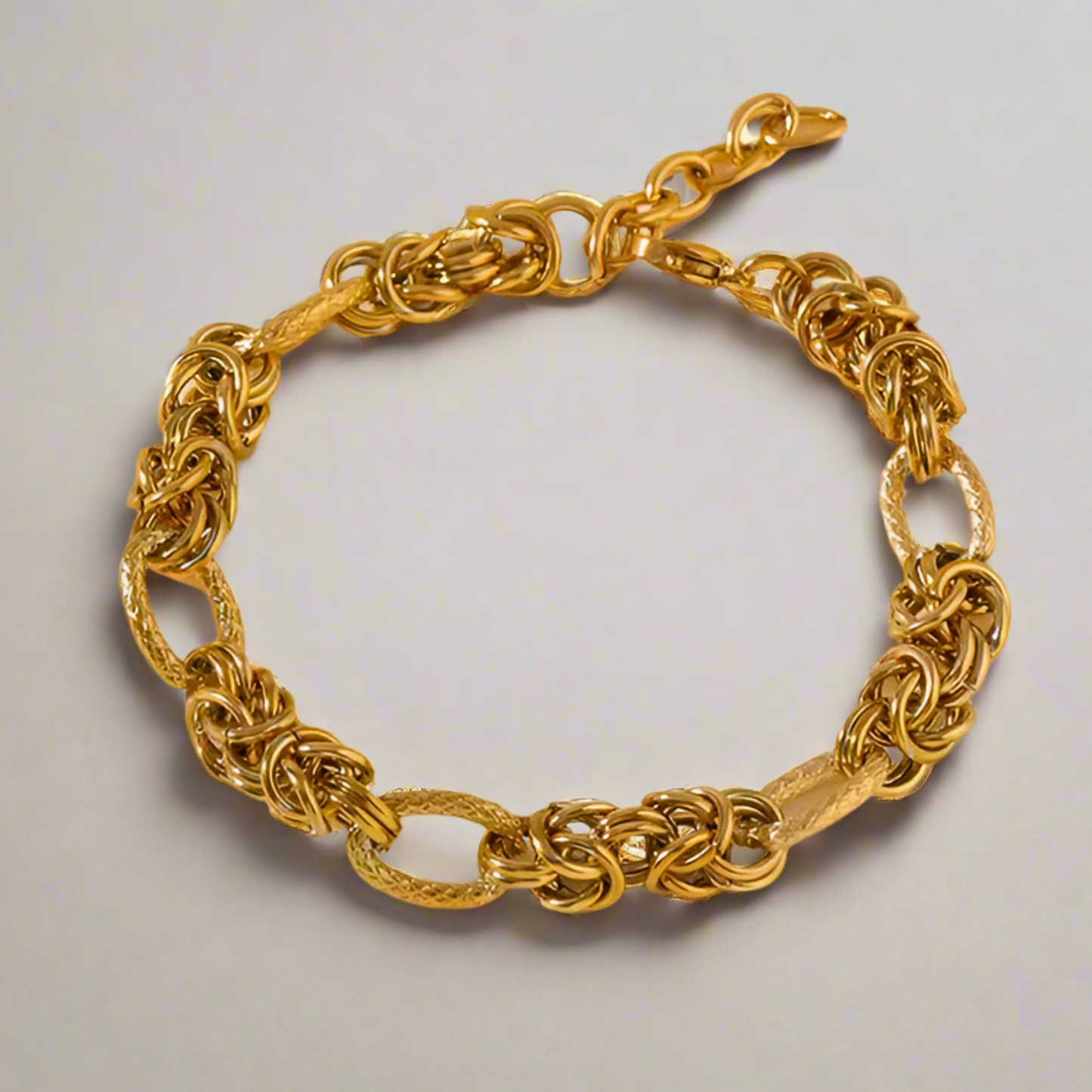 Women's Luxurious Yellow Gold-Plated Byzantine Diamond-Cut Oval Link Adjustable Bracelet in Stainless Steel