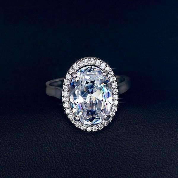 Feshionn IOBI Rings ON SALE - "Celebrity" 6 Carat Oval Engagement Ring in White Gold Plated Halo Setting Ring