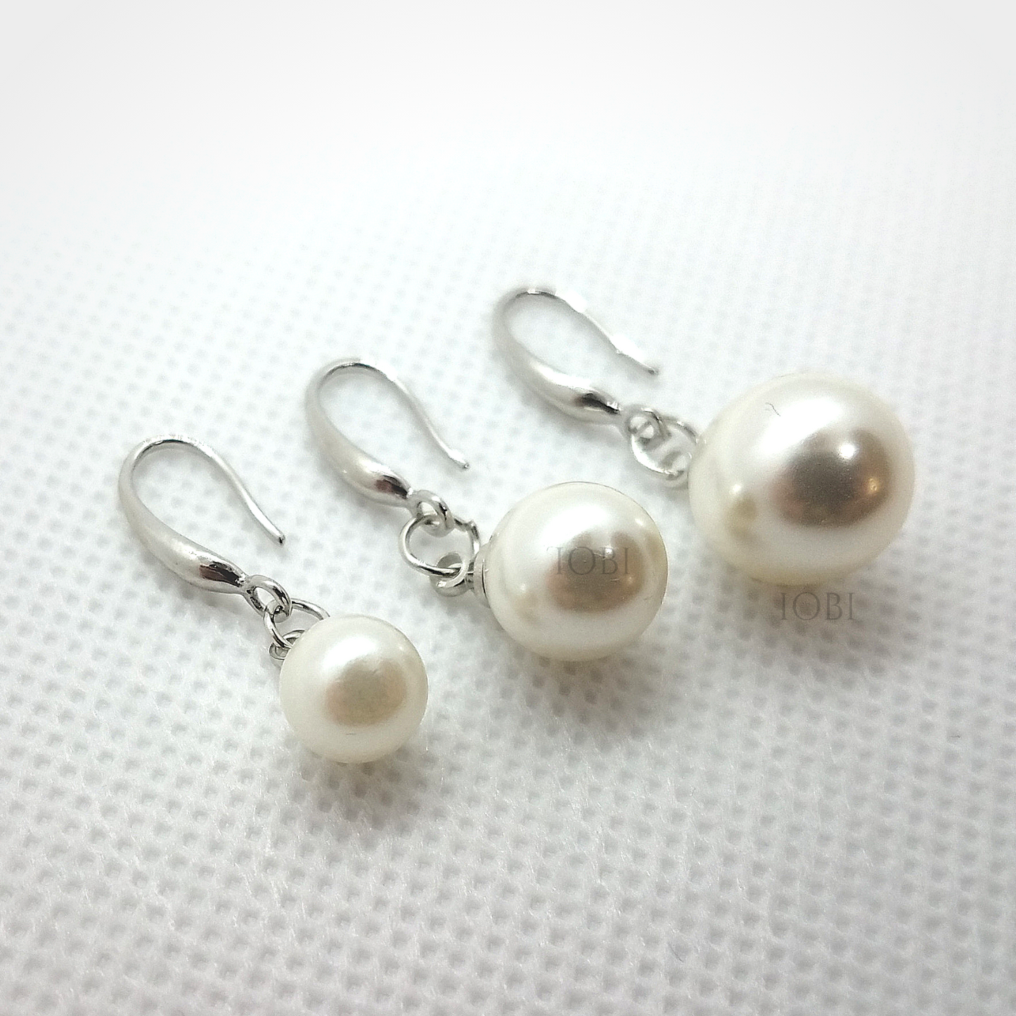 Naked IOBI Pearl Drill Earrings in Three Sizes for Woman