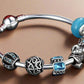 Feshionn IOBI bracelets ON SALE - Beary Cute Aqua Crystal & Hearts Silver Bangle Bracelet