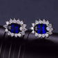 Feshionn IOBI Earrings Swiss Blue Oval Cut 1CTW Simulated Sapphire IOBI Precious Gems Halo Earrings