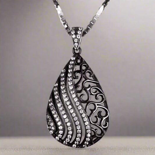 Feshionn IOBI Necklaces Black Ebony Swirl Black Gold Filigree and CZ Pendant Necklace